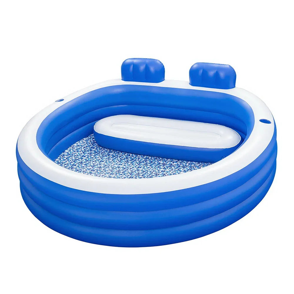 Blue and white inflatable pool with built-in backrests and a floating seat inside