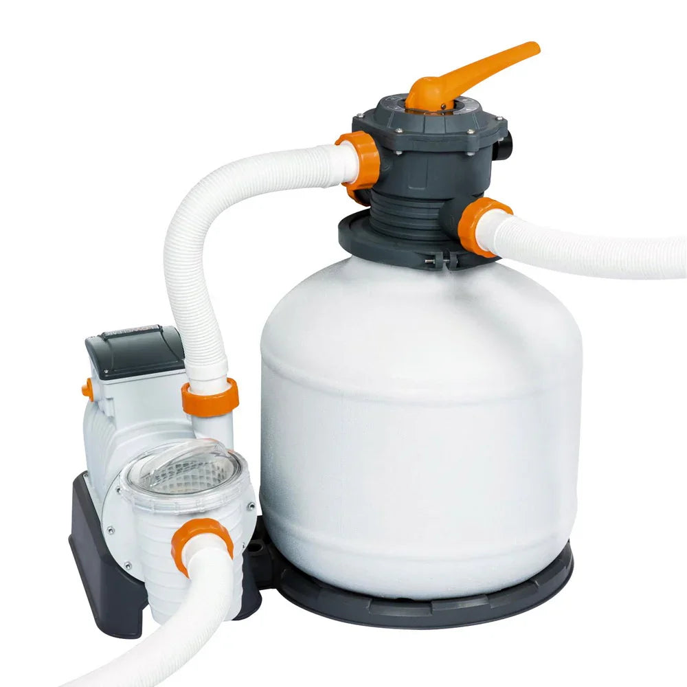 White and gray sand filter pump with orange valves and white hoses for pool water filtration