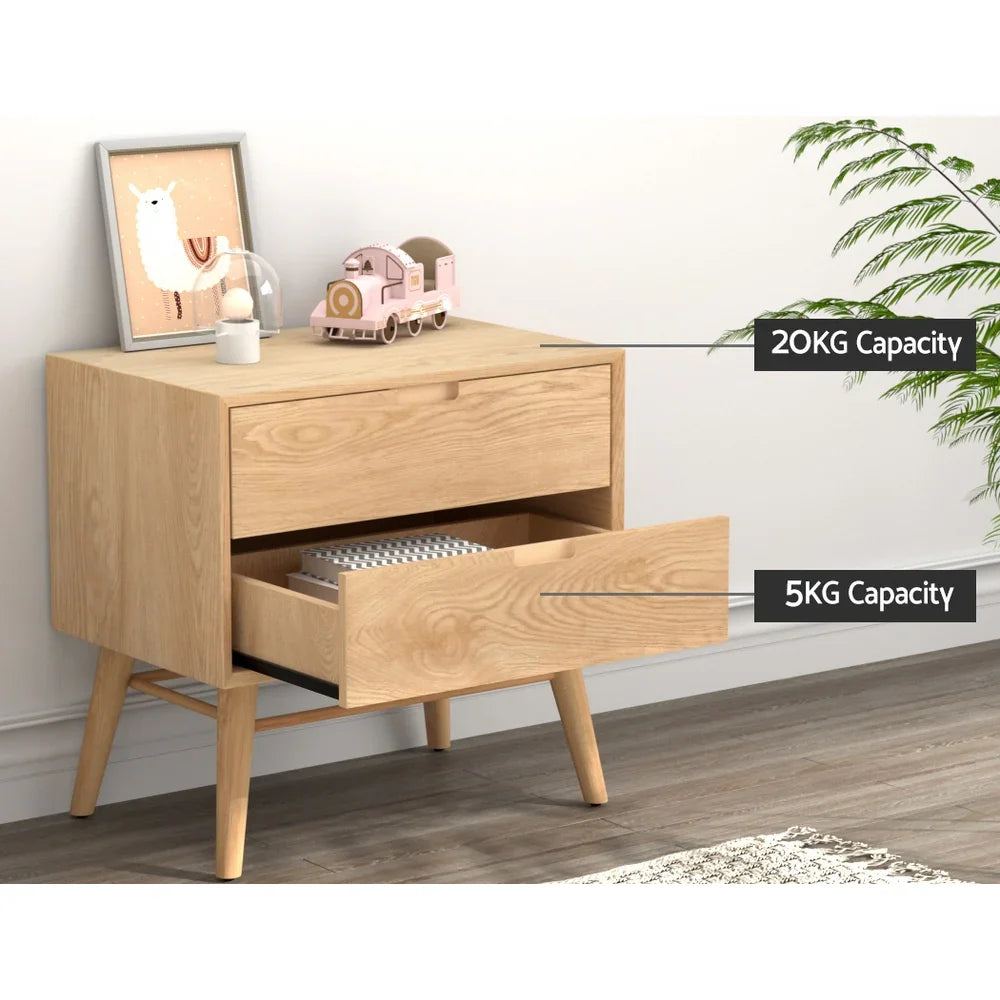 Light wood bedside table with two drawers, 20kg top and 5kg drawer capacity, decor on top