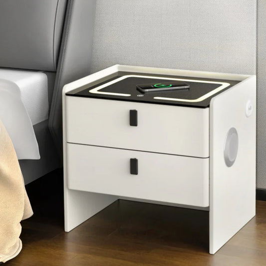 Modern white nightstand with drawers, LED lights, wireless charging and speaker, next to bed