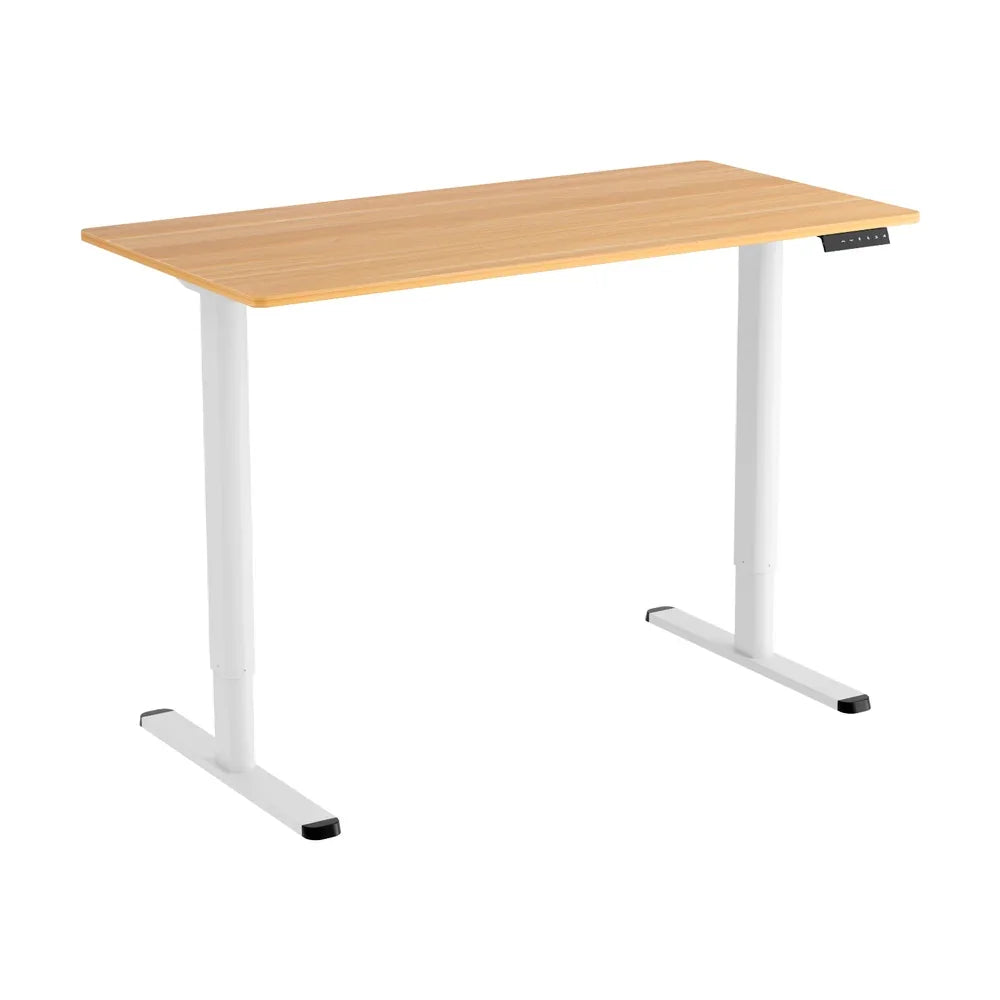 Modern adjustable height desk with light wood top and white metal legs isolated on white