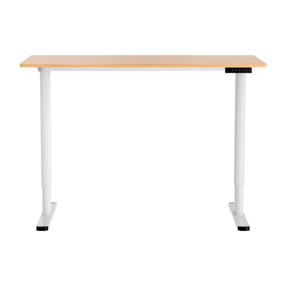 Modern adjustable standing desk with light wood top and white metal legs and control panel
