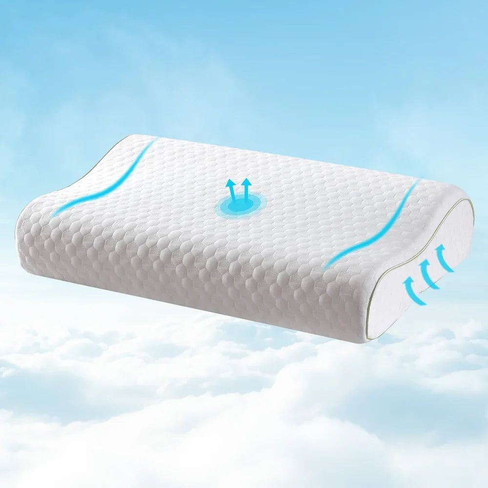 White ergonomic memory foam pillow with textured surface and blue airflow icons floating above clouds