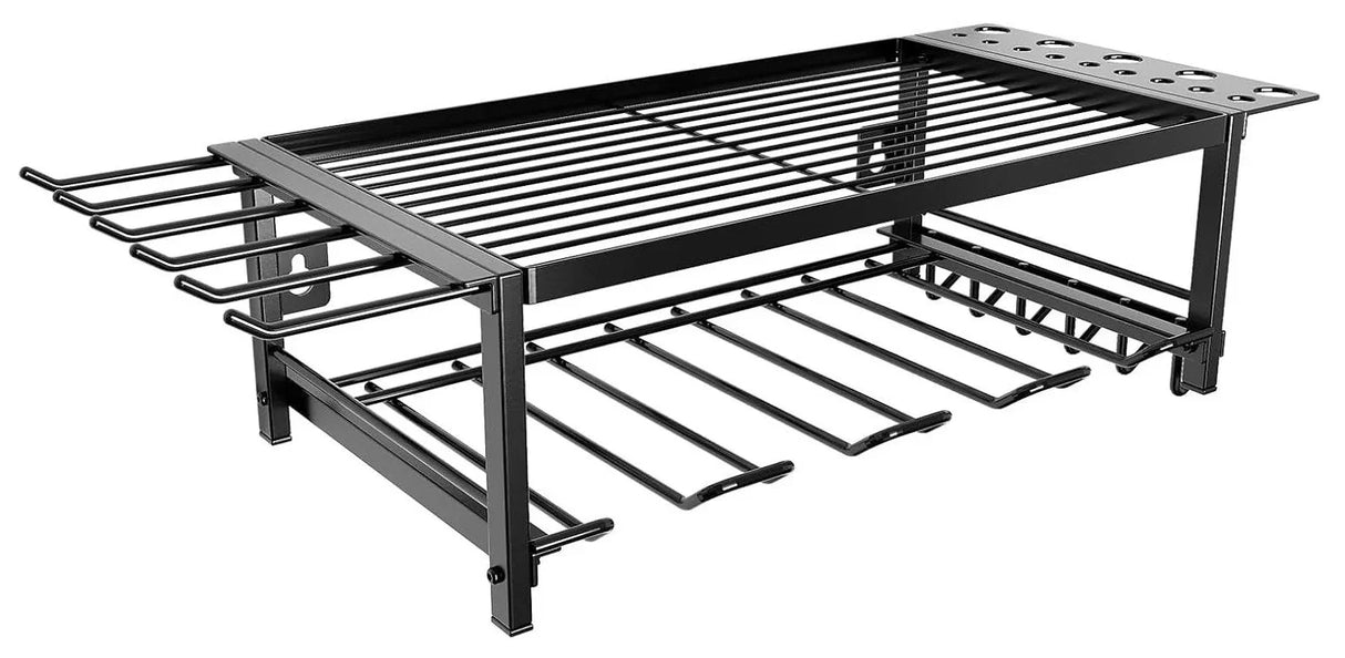 Black metal barbecue grill rack with skewer holders and side utensil slots