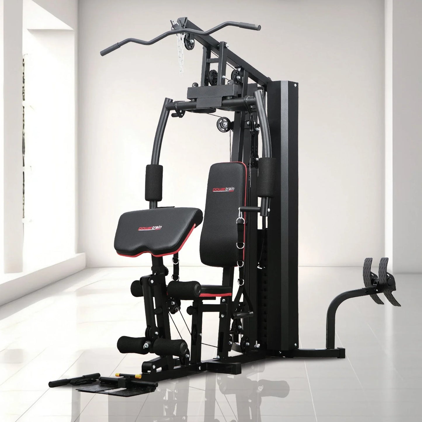 Powertrain multi-station home gym machine in a bright, modern room