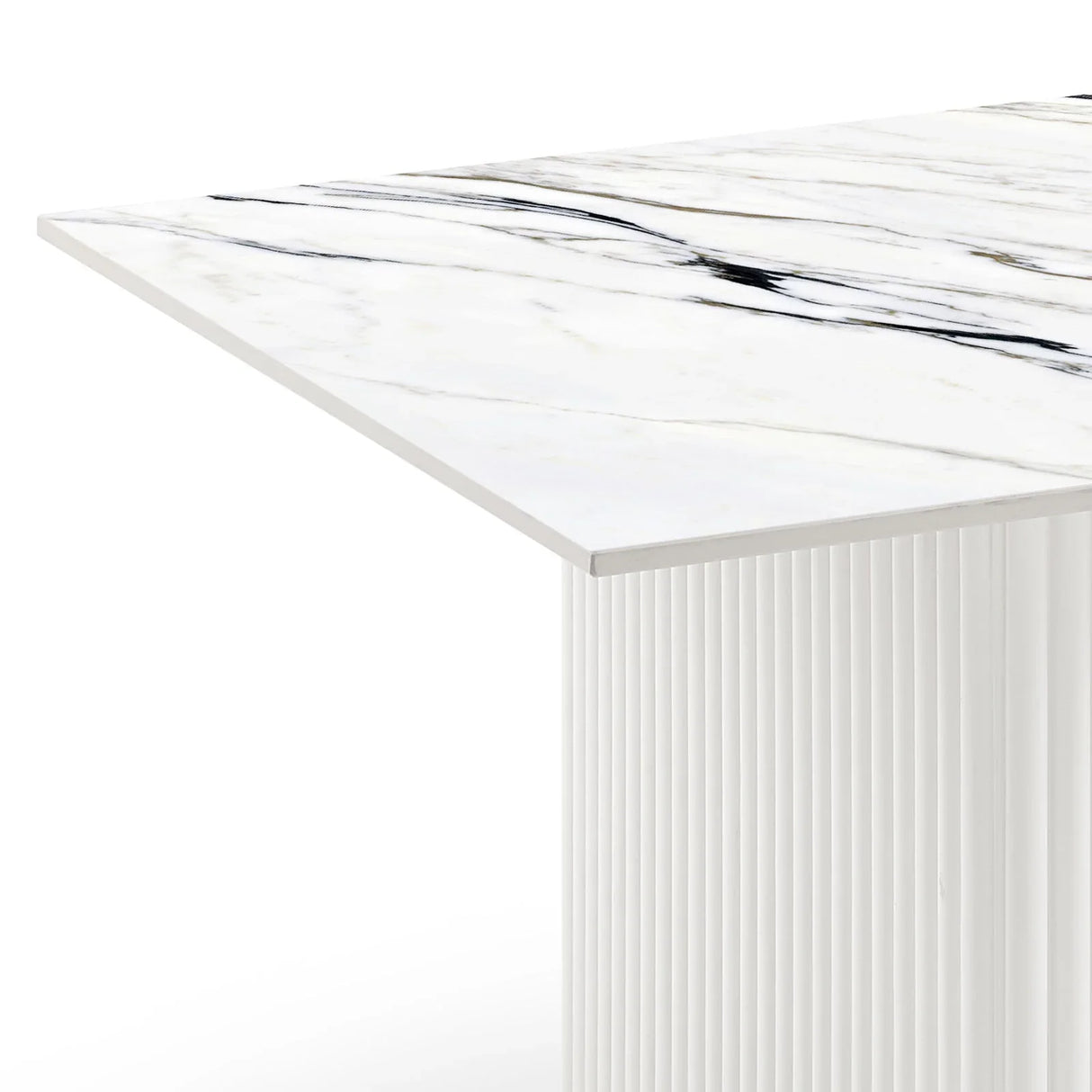 Modern white marble dining table with fluted base and black veining detail