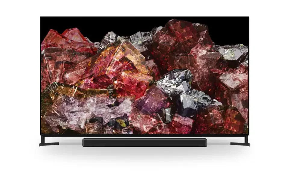 4K smart TV on white background, displaying vibrant colored crystals, Flea Market AU bargain electronics.