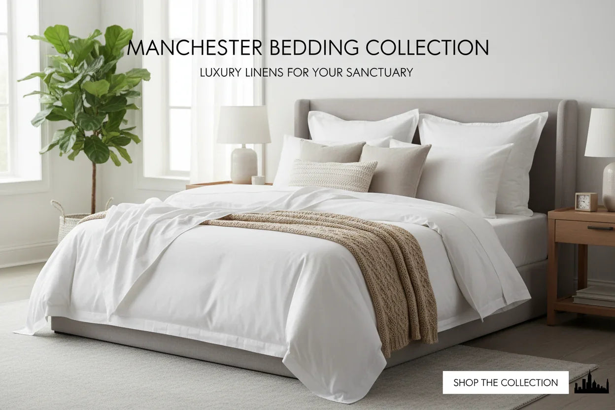 Modern bedroom with Manchester Bedding Collection featuring white linens, beige throw, and cozy pillows