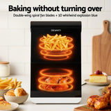 Devanti air fryer oven cooking fries and chicken, kitchen counter with food, baking without turning over