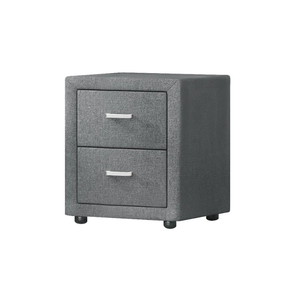 Modern grey fabric two-drawer nightstand with metal handles on white background