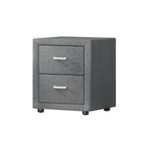 Modern grey fabric two-drawer nightstand with metal handles on white background