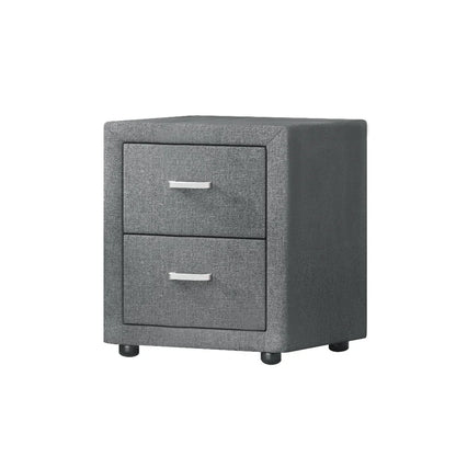 Modern grey fabric two-drawer nightstand with metal handles on white background