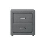 Modern gray fabric nightstand with two drawers and metal handles on white background