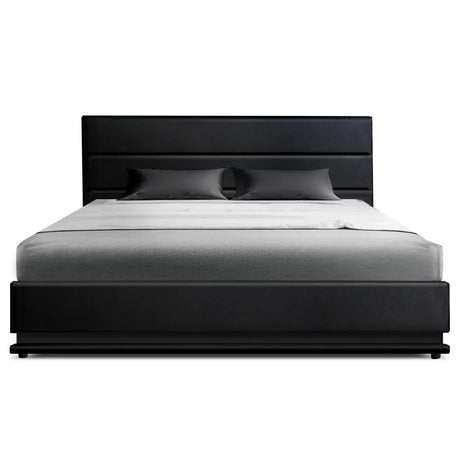 Modern black leather bed frame with matching headboard and gray bedding