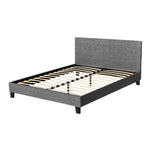 Modern gray upholstered bed frame with wooden slats and dark tapered legs