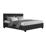 Modern black upholstered bed frame with tufted headboard and gray bedding