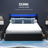 Modern bedroom featuring DUNN black bed frame with blue LED headboard lighting and white bedding