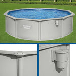 Bestway Hydrium above ground round pool with blue water and gray metal frame on green lawn
