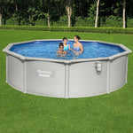 Three people enjoying Bestway Hydrium above-ground pool in sunny backyard with green grass
