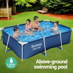 Family enjoying Bestway Steel Pro above-ground swimming pool with clear blue water in backyard