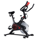 Black Everfit stationary exercise bike with red accents and adjustable seat for indoor fitness