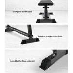 Flat weight bench with strong steel frame, powder coated finish, and capped feet for protection