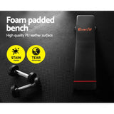 Everfit foam padded flat bench with dumbbells on textured black gym floor, stain-proof and tear-resistant features highlighted.