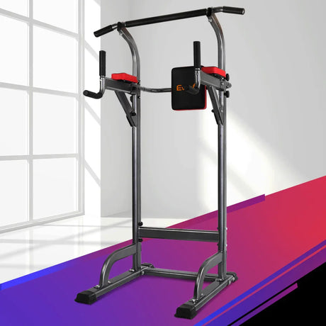 black and grey power tower pull-up and dip station with red cushions in bright gym room