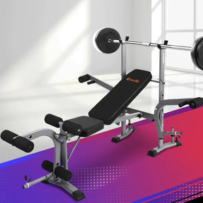 Everfit adjustable weight bench with leg extension and curl attachment in bright fitness room