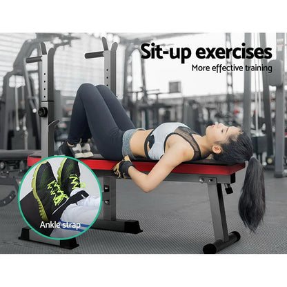 Woman performing sit-up exercises on red gym bench with ankle strap in fitness center