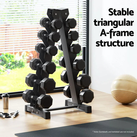 Black metal A-frame dumbbell rack with multiple hex dumbbells in a bright home gym