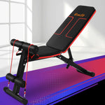 Everfit adjustable black and red workout bench with resistance bands in a bright room