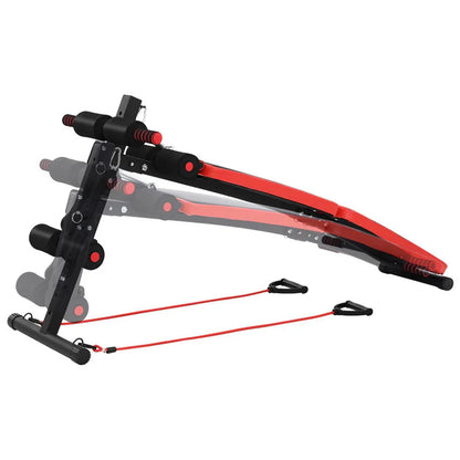 Adjustable red and black sit-up bench with resistance bands for home gym workouts