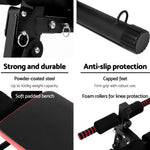 Sit-up bench features powder-coated steel, soft padded seat, capped feet, and foam rollers.