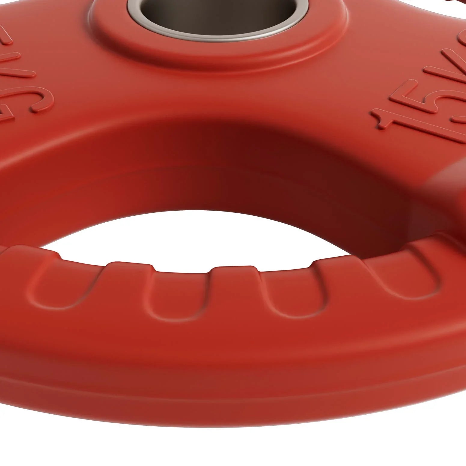 Close-up of red 15kg weightlifting bumper plate with grip handles and metal center ring