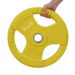 Hand holding yellow Everfit 20kg weight plate with grip holes on white background