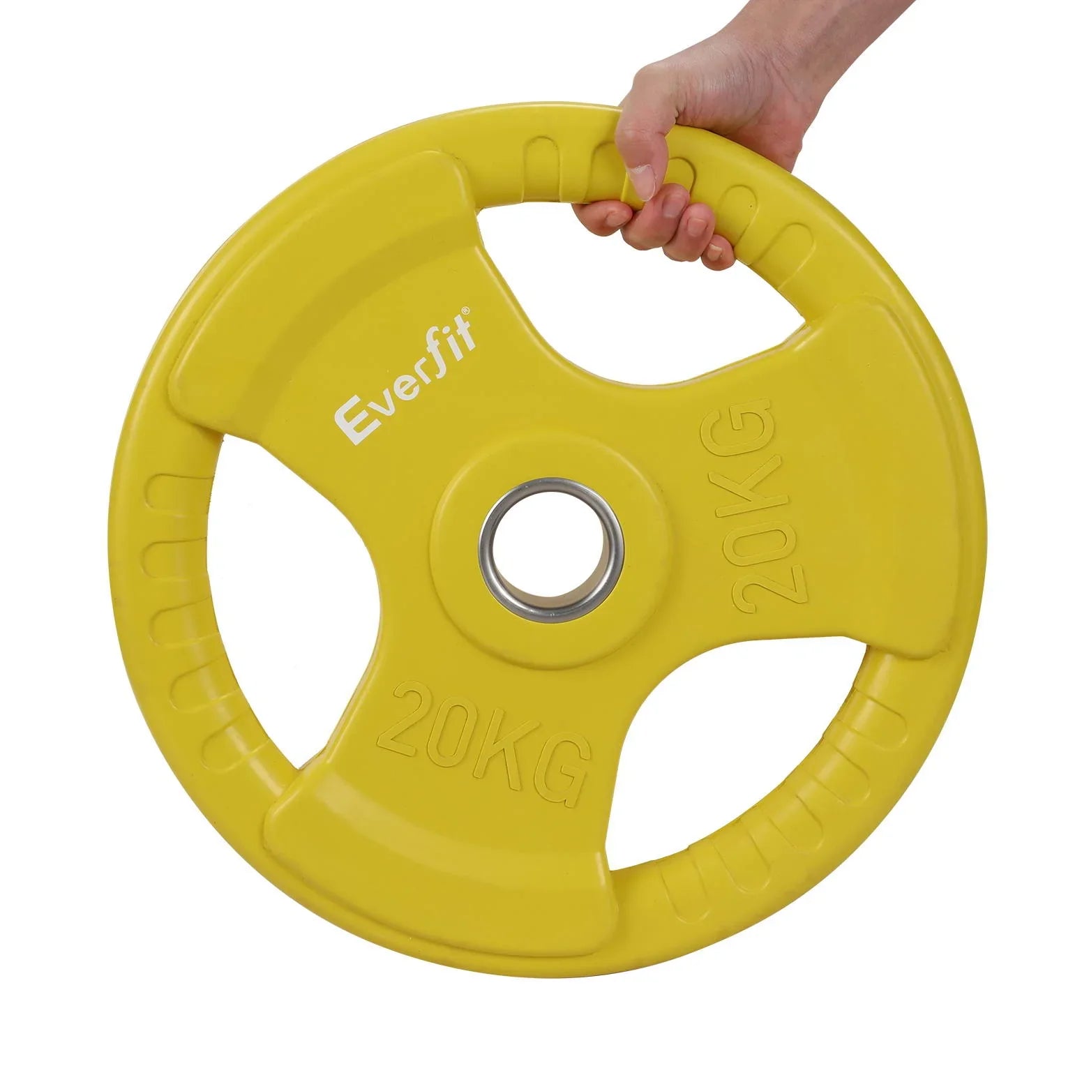 Hand holding yellow Everfit 20kg weight plate with grip holes on white background