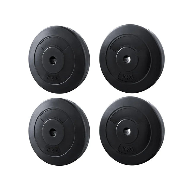 Set of two black 5kg and two 10kg weight plates for barbells isolated on white background