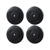 Set of four black 10kg rubber weight plates for gym barbell lifting