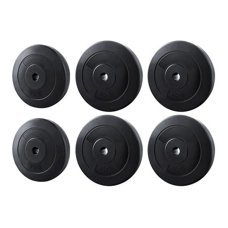 Set of six black rubber weight plates, 2x5kg and 4x10kg, for fitness and weightlifting
