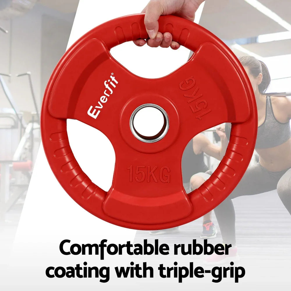 Red Everfit 15kg rubber-coated weight plate with triple grip held in hand, gym background