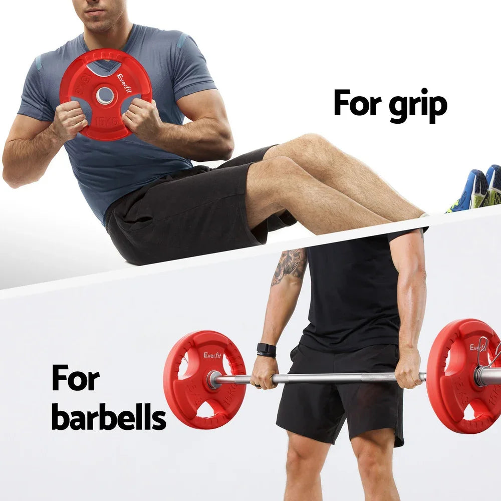 Man exercising with red Everfit 15kg weight plates for grip and barbells in gym workout