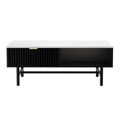 Modern black coffee table with white top, single drawer, open shelf, and gold handle
