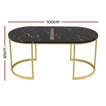 Oval black marble coffee table with gold metal frame, 100x50x45cm dimensions shown.