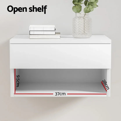 White wall-mounted open shelf with vase, books, and visible dimensions 9.5x37x28cm