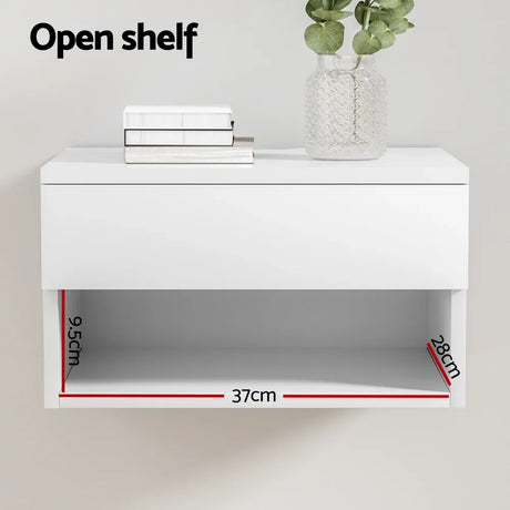 White wall-mounted open shelf with vase, books, and visible dimensions 9.5x37x28cm
