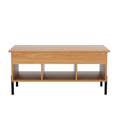Modern coffee table with light wood finish, three open storage cubbies, and black legs