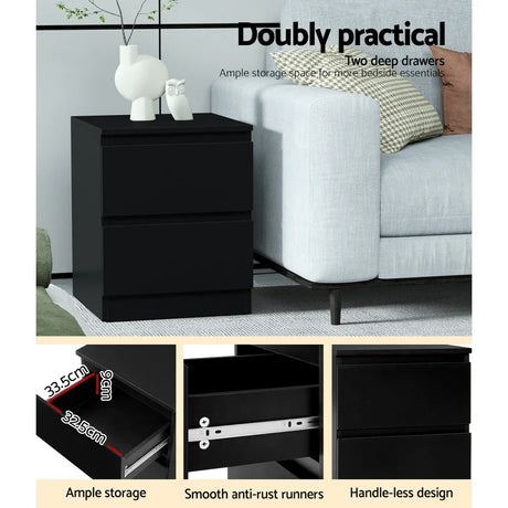 Modern black bedside table with two deep drawers, next to grey sofa, minimal decor.