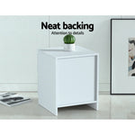 Modern white nightstand with neat backing, cactus plant decor, and minimalist room setting
