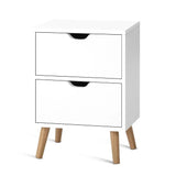 Modern white wooden nightstand with two drawers and angled oak legs